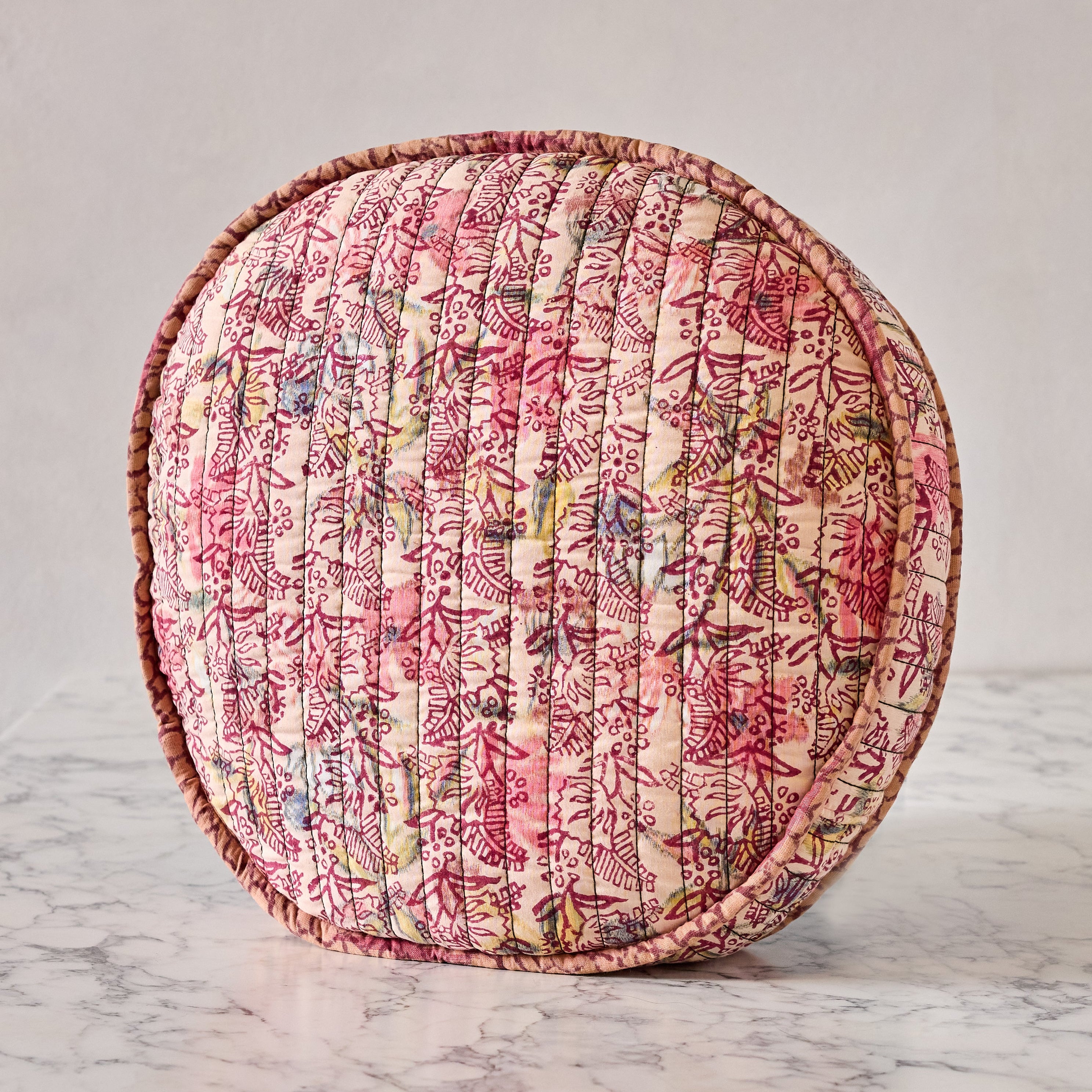 Hand-blocked Pillow in Berry Petals Party, Round