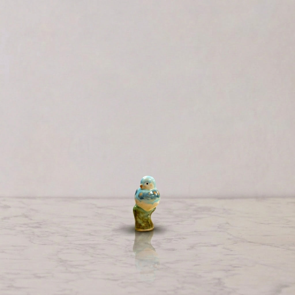 Songbird on Branch, Glacier & Sand